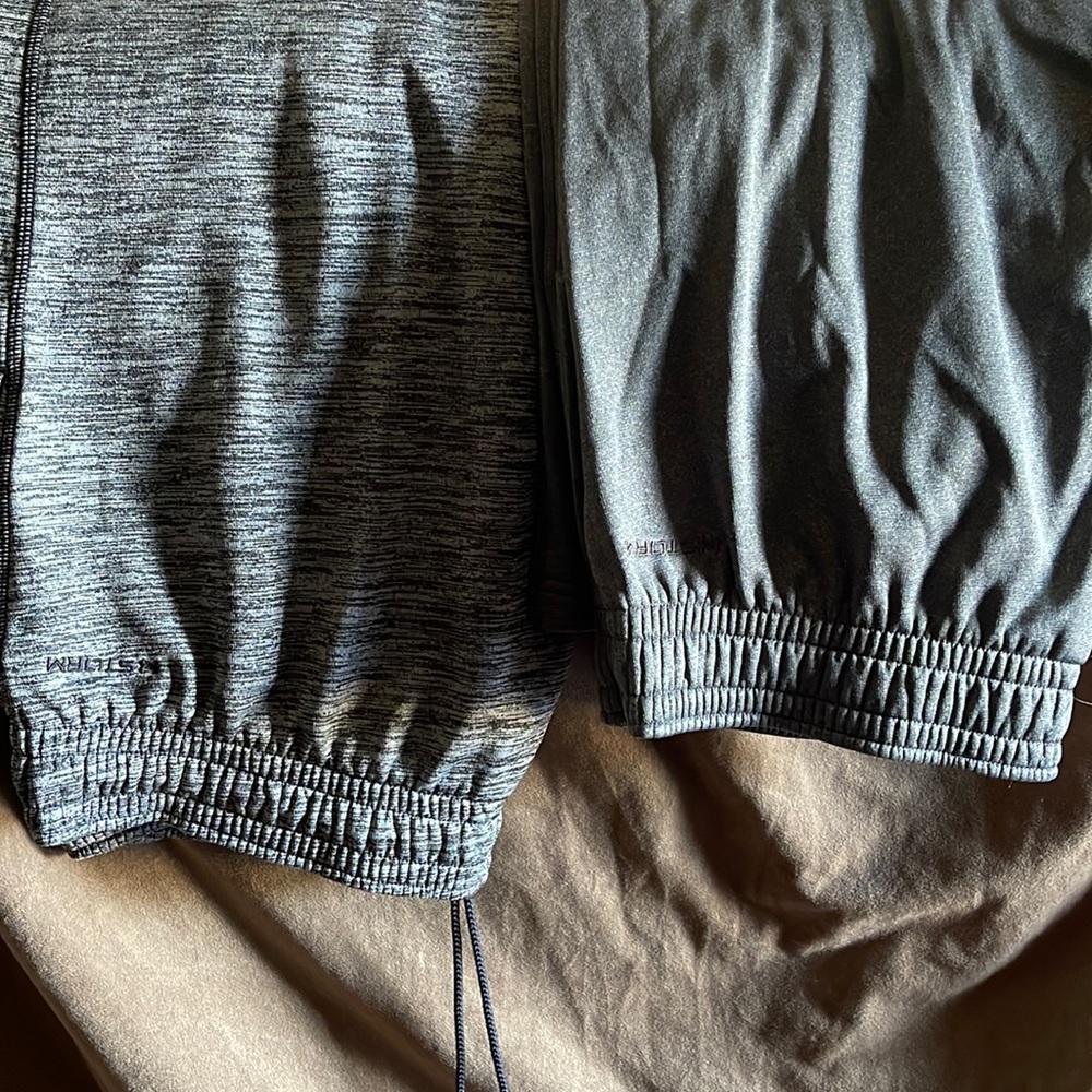 2 pairs of XL storm UA SWEAT PANTS